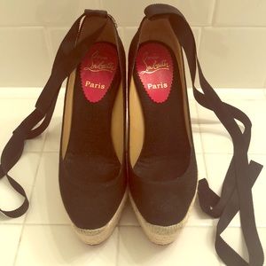 Christian Louboutin Espadrille wedge w/ ankle tie.